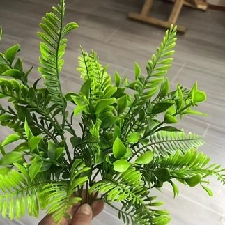 A03 artificial foliage accessory (fern sprig)