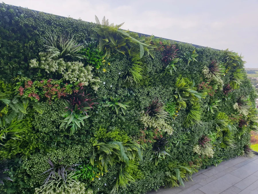 Artificial plant wall for commercial spaces